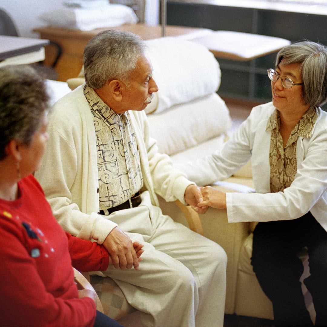 Dr. Helena Chui talking with patient