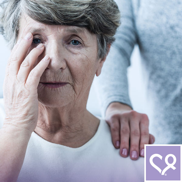 comforting hand on shoulder of distraught woman