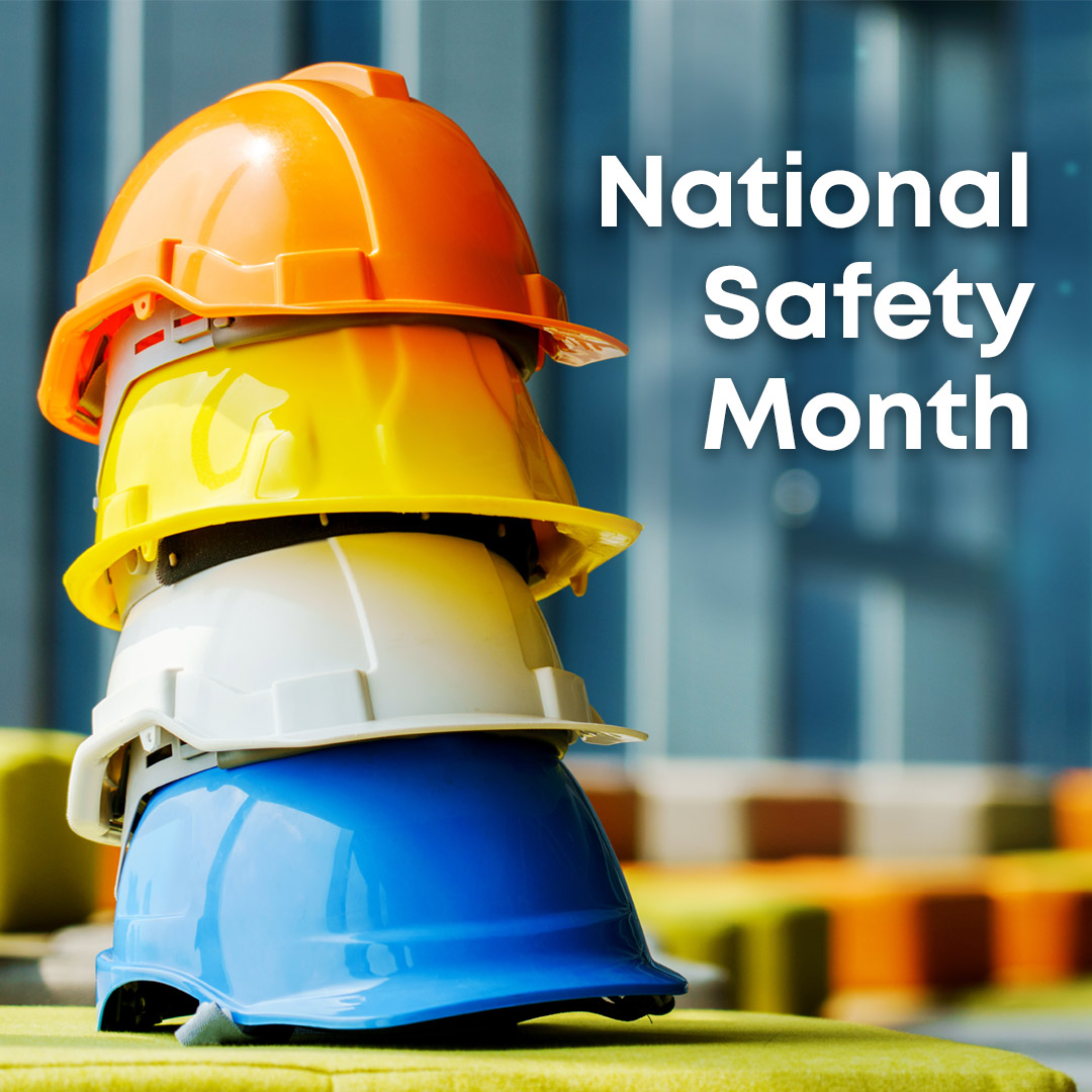 National-Safety-Month colorful safety hard-hats stacked together