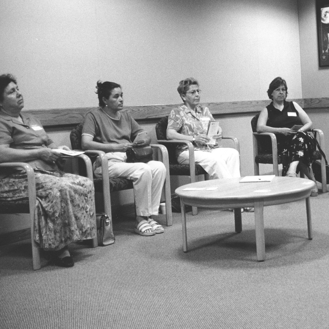 support group participants seated in a circle