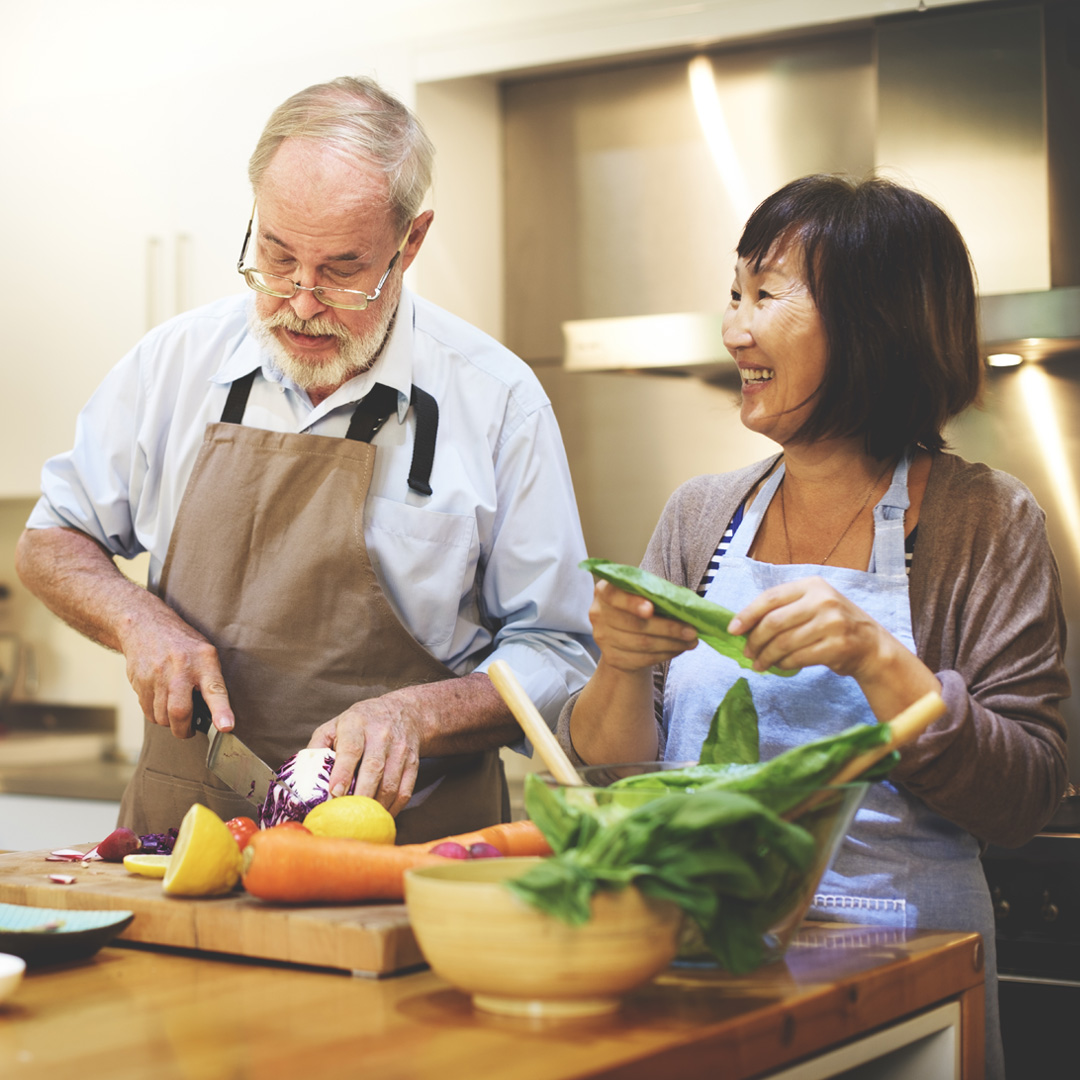 older couple preparing a meal together