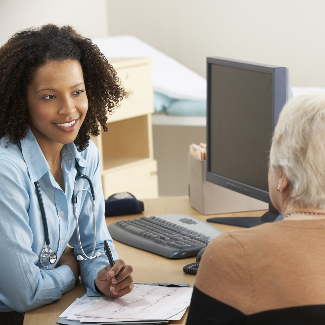 doctor talking with patient