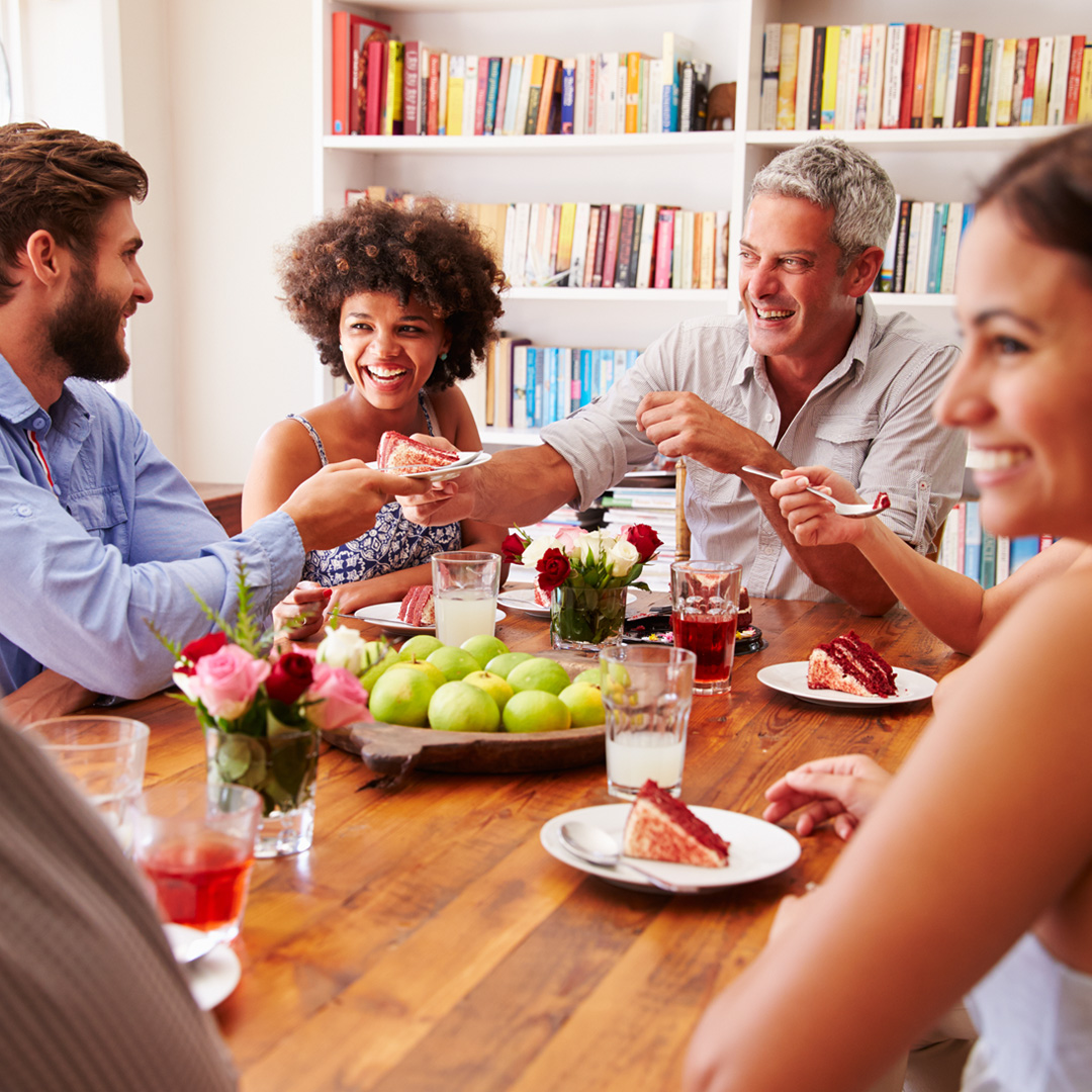 group of friends having a dinner party at home