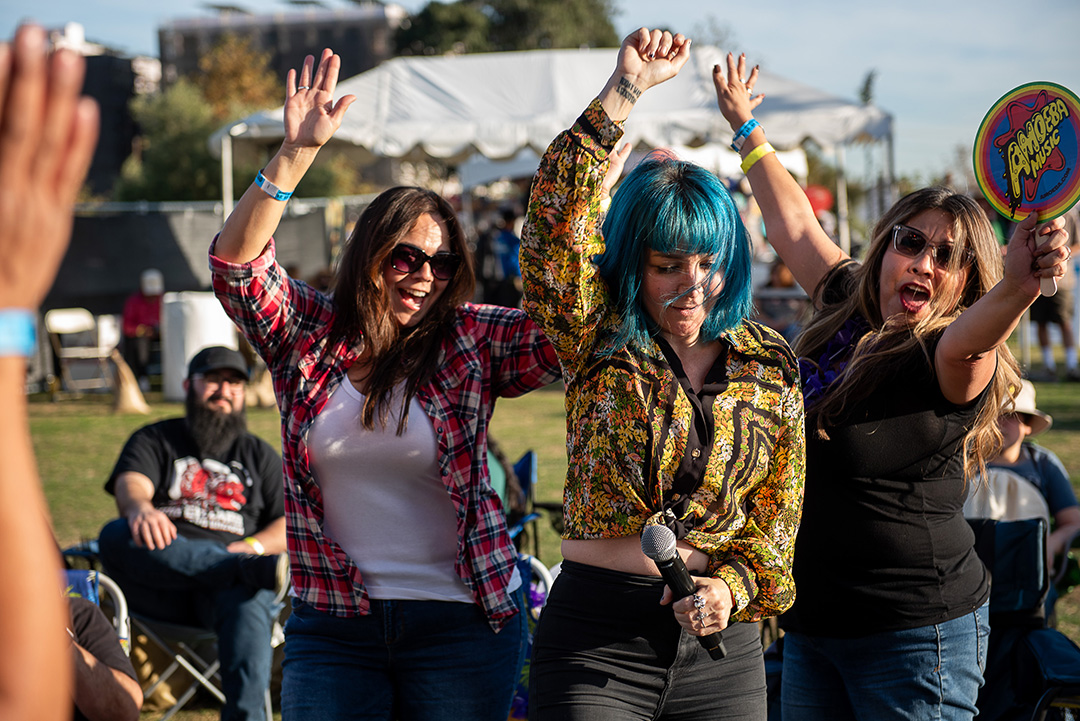 Lead singer of Beaux Gris Gris & The Apocalypse dancing in the audience