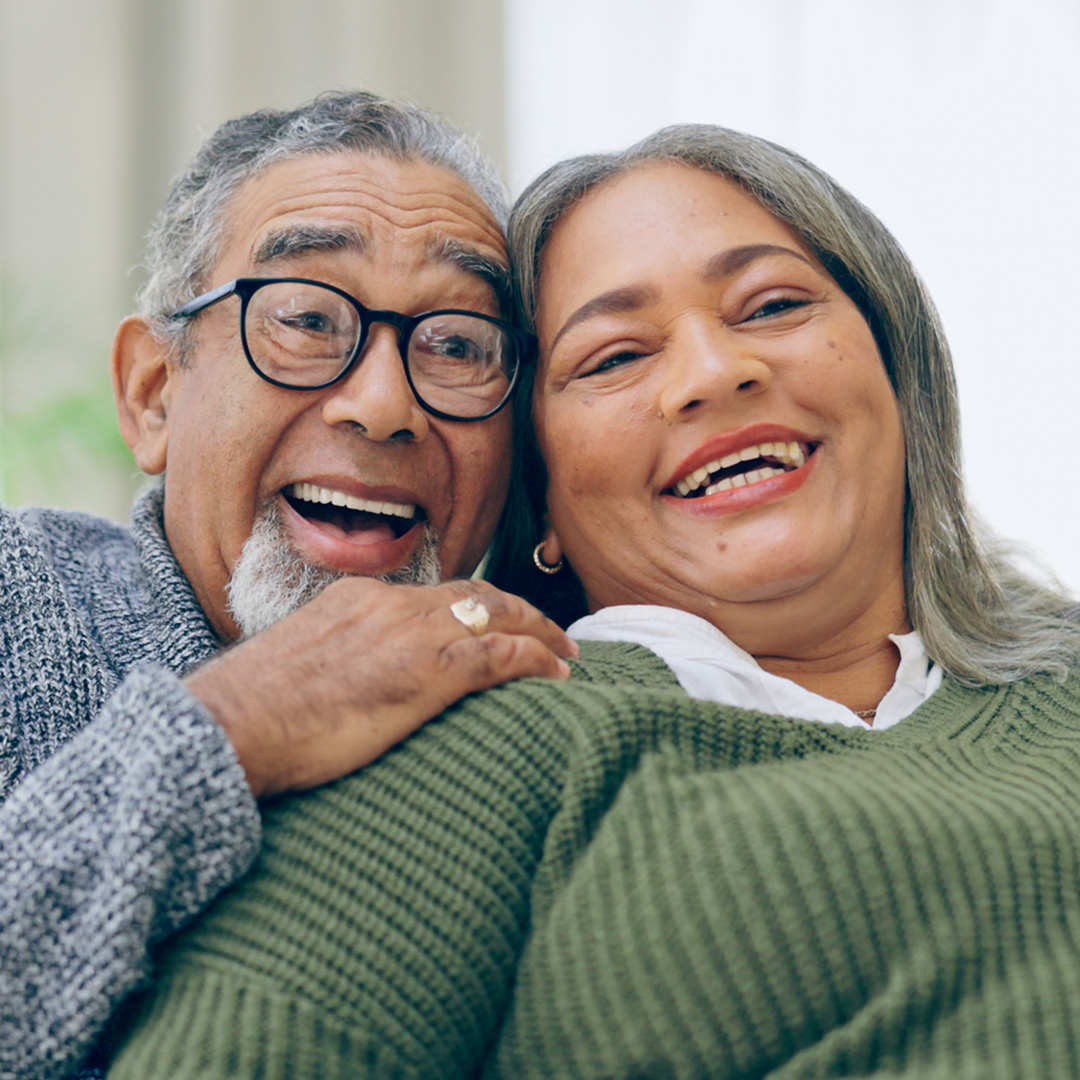 man and woman laughing together