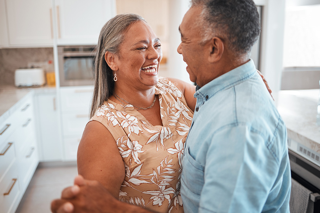 couple smiling and dancing