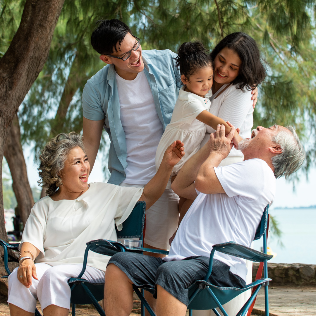 Multigenerational family vacationing at the beach