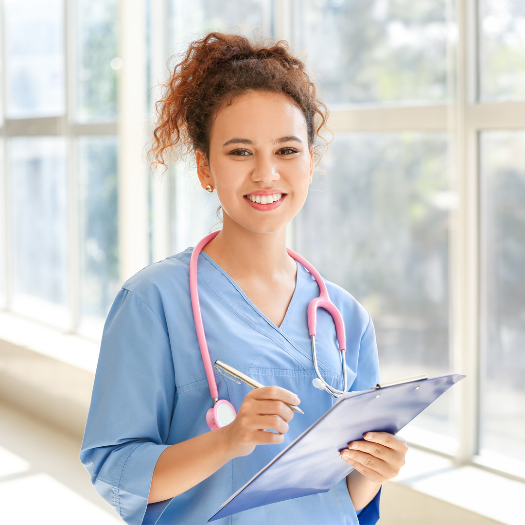 ECM-nurse nurse writing on a clipboard