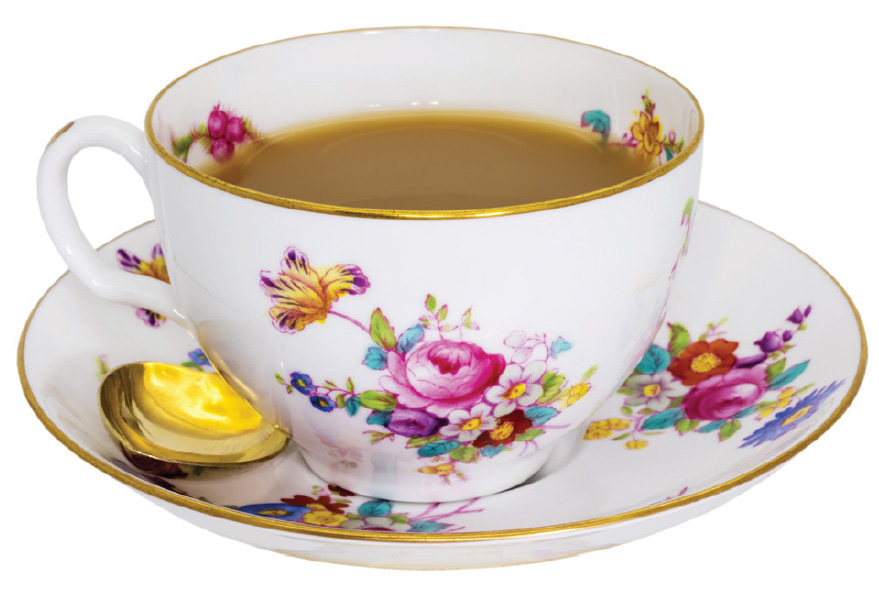 porcelain tea cup with painted flowers on it